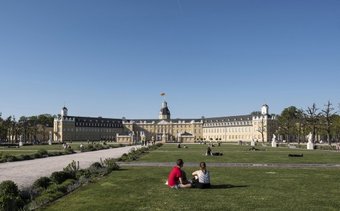 View of Karlsruhe Castle from the beautiful palace garden View of Karlsruhe Castle from the beautiful palace garden